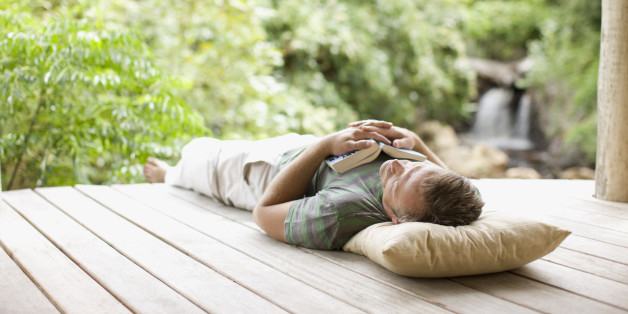 Man napping on porch in remote area