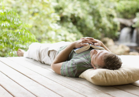 Man napping on porch in remote area